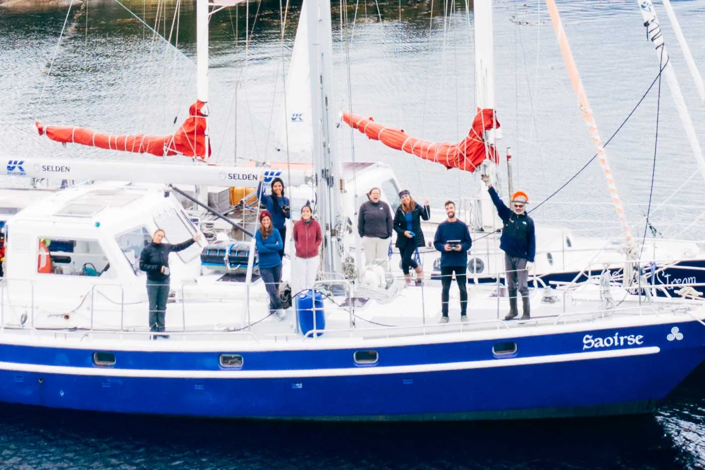 The team gathered on the deck of the Saoirse.